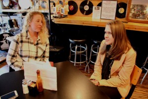 Pictured right, 25-year-old Emily Barnes and 32-year-old Megan Myers, the co-owners of The Human Village Brewing Co. sitting inside the Bus Stop Music Cafe on South Broadway, in Pitman, on Tuesday, Jan. 19, 2016, discussing the brewery industry and their plans to open their brewery in the Bus Stop Music Cafe in the spring. (Spencer Kent | For NJ.com)